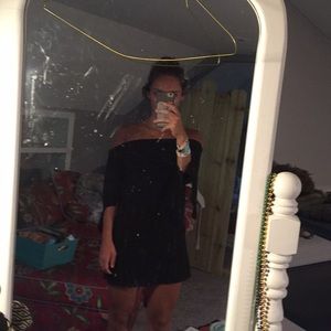 Across the shoulders black dress